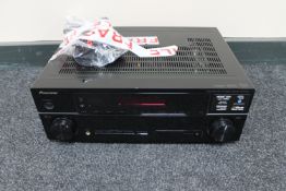 A Pioneer VSX-520 audio video multi-channel receiver with lead and remote