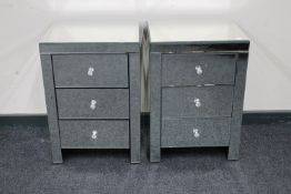 A pair of contemporary mirrored three drawer bedside chests