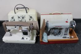 Two cased Jones sewing machines