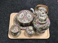 A tray containing fifteen pieces of Japanese porcelain ware decorated with pink flowers