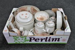 A box containing Denby stoneware pottery tea and dinner ware