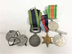 Three WWII medals to include War Medal, Defence Medal and 1939-45 Star,