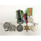 Three WWII medals to include War Medal, Defence Medal and 1939-45 Star,