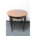 A 20th century continental mahogany occasional table