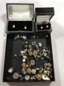 A collection of earrings, some sterling silver, pearl stud earrings etc.