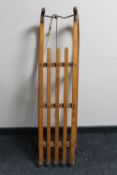 A vintage 20th century wooden sledge