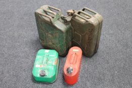 Two Jerry cans and two petrol cans