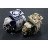 Two glazed pottery elephant plant stands CONDITION REPORT: Green 43cm high.