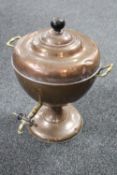 An antique copper and brass samovar