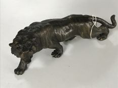 A bronze figure of a tiger