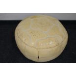A Moroccan leather footstool
