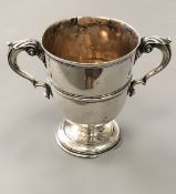 An Irish silver twin-handled trophy cup with presentation inscription dated 1897
