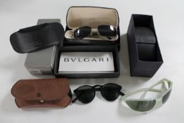 Five pairs of designer sunglasses - Ray Ban, Prada,