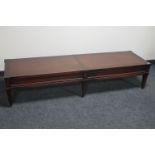 A mahogany rectangular coffee table