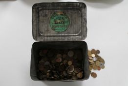 A vintage Colmans Mustard tin containing foreign coins
