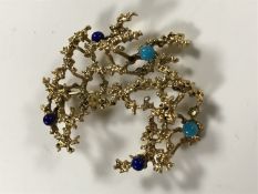 A 9ct gold turquoise and lapis lazuli set brooch, 6.3g.