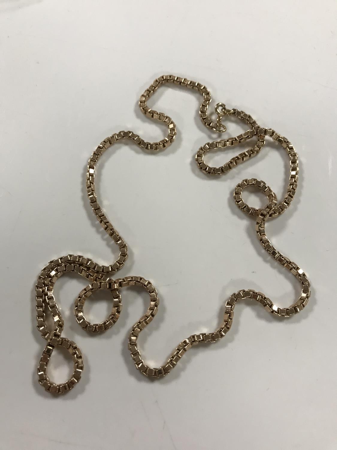 A 9ct gold long chain, 29.7g.