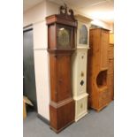 An antique oak longcase clock with brass moonphase dial,