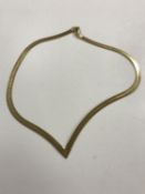 A 14ct gold flat necklace, 18.7g.