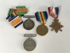 A group of four medals with ribbons - two Victory medals,