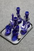 A tray of seven pieces of antique hand painted blue glass ware