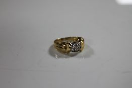 A continental yellow gold ring set with diamonds, indistinctly stamped, 3.4g, size H.