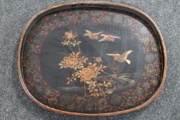 A Chinese lacquered papier mache tray