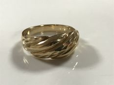 A 9ct gold textured ring, 3.1g, size O/P.