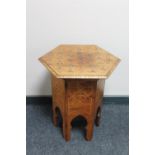 A Middle Eastern inlaid folding occasional table