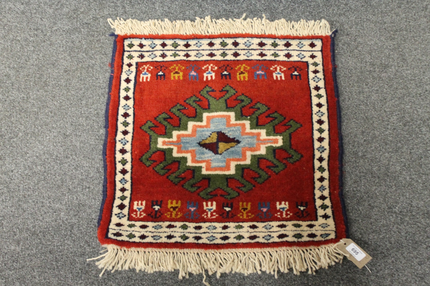 A Caucasian prayer rug,