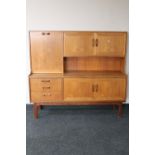 A mid 20th century G Plan cocktail sideboard