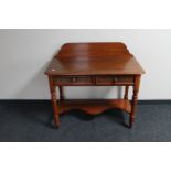 A Victorian mahogany wash stand fitted two drawers