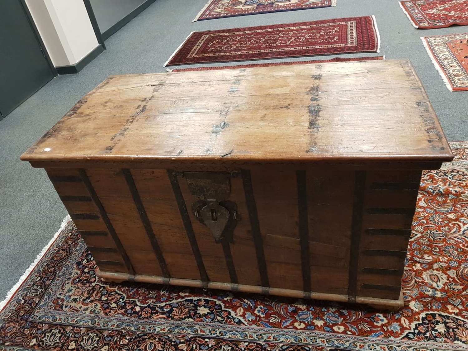 A heavy quality iron bound shipping trunk,