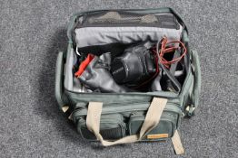 A camera bag containing a Pentax ME Super camera with lens, three further lenses,