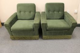 A pair of mid twentieth century armchairs upholstered in green dralon
