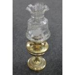 A Victorian brass Benetfink oil lamp with etched shade and glass chimney