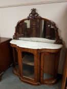 A Victorian walnut marble topped mirror backed chiffonier,