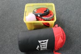 An Everlast punch bag and a box of BBE boxing pads and gloves