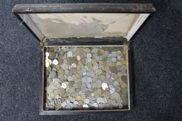 An Edwardian oak canteen of foreign coins
