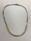 A 9ct gold flat chain necklace, 11g.