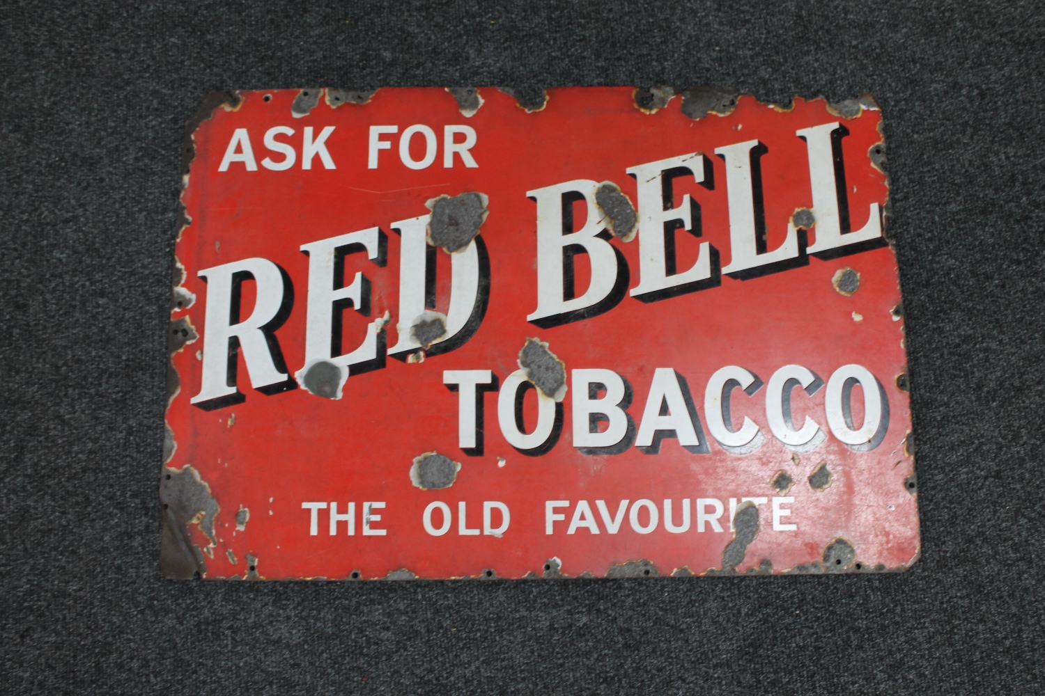 An early 20th century Ask for Red Bell tobacco the old favourite enamelled sign