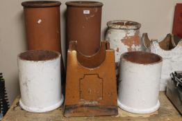 Seven antique chimney pots
