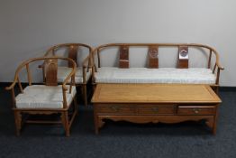 A Chinese four piece lounge suite comprising three seater settee,