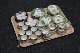 A tray of antique Paragon china cups and saucers,