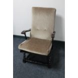 A mid 20th century rocking chair