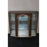 A mid 20th century melamine display cabinet