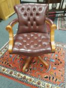 A good quality Burgundy leather office chair,