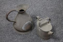 An antique copper jug and a copper watering can