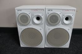 A pair of white Jamo compact 90 wall speakers