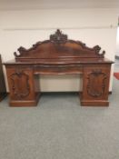 A Victorian mahogany pedestal serpentine fronted sideboard, width 215 cm.